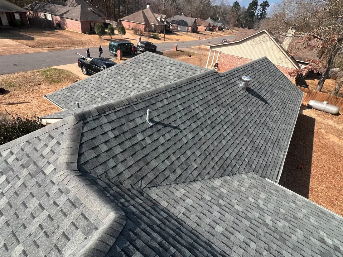 Aerial view of a completed Best Price Roofing system